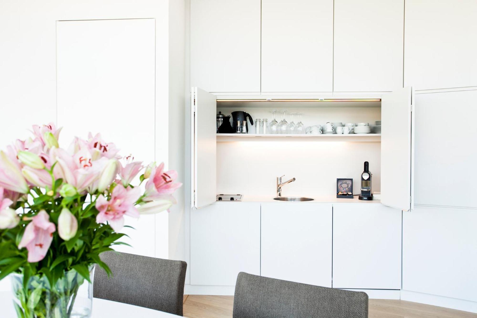 シュロスバーグホテル ダス クンストホテル グラーツ エクステリア 写真 A kitchen in a serviced apartment