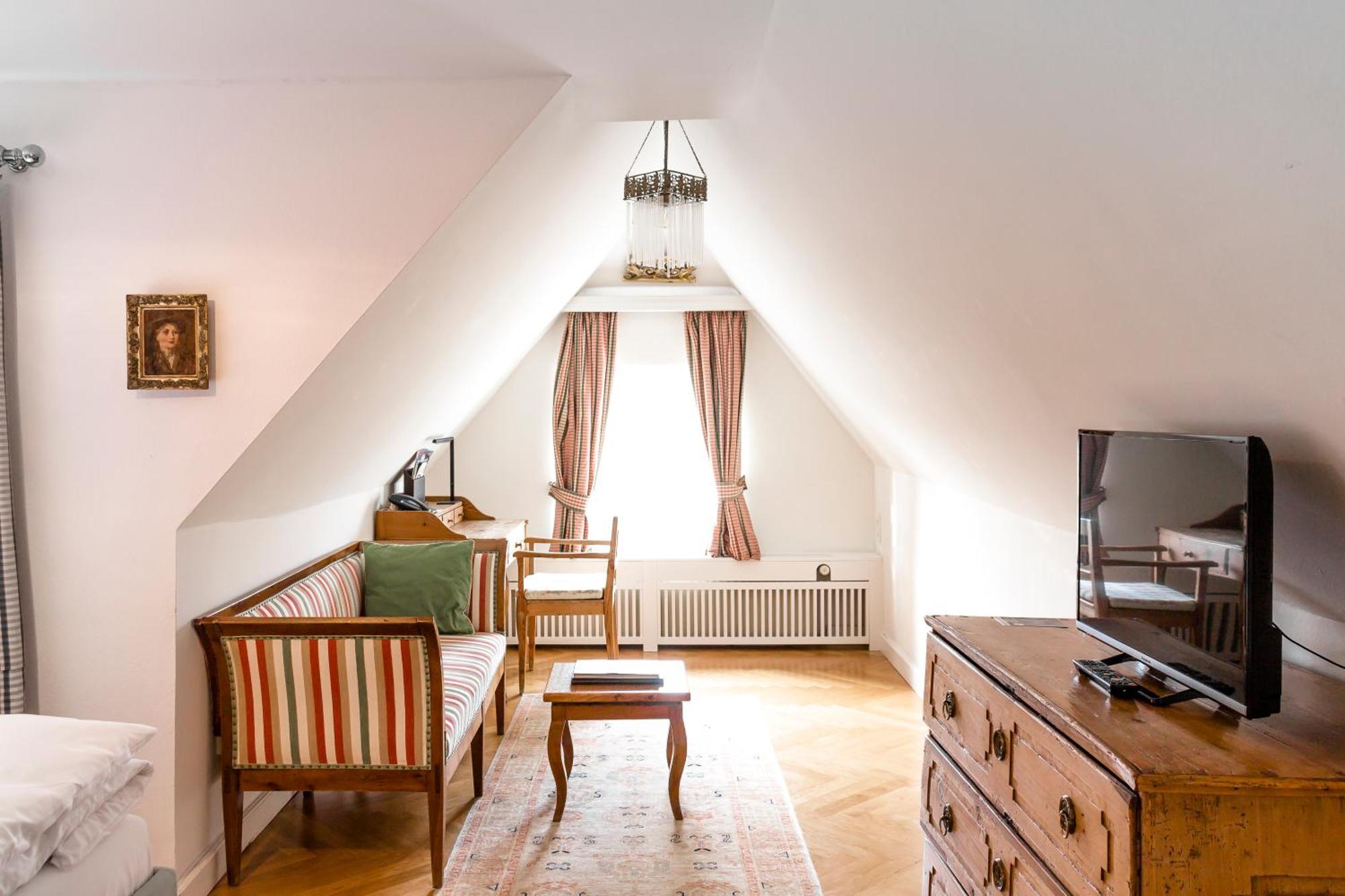 シュロスバーグホテル ダス クンストホテル グラーツ エクステリア 写真 A room in the hotel